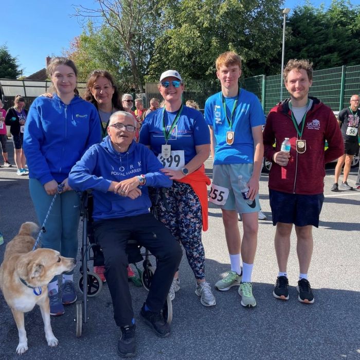 Haxby 10k with Simon (pictured front), his children, cousin Catherine and Billy dog