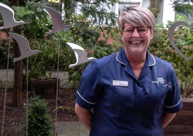 smiling nurse in garden