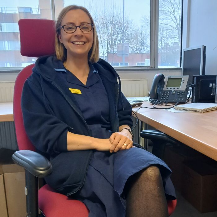 nurse in uniform smiling
