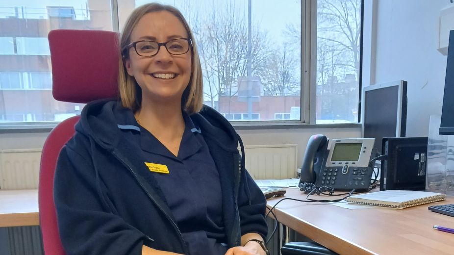 nurse in uniform smiling
