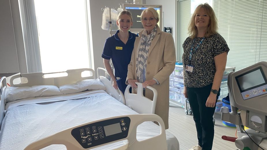 Local fundraiser, Denise Byas (pictured centre) with members of the palliative care team