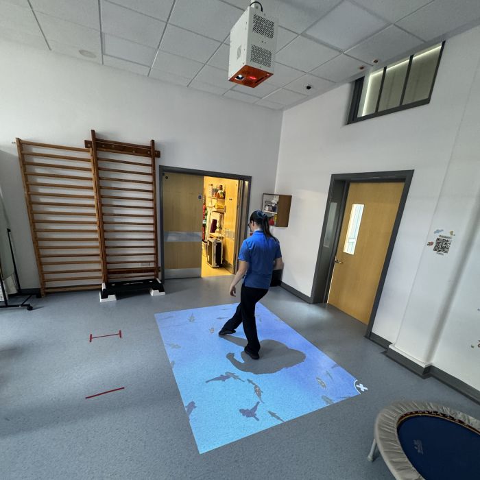 Therapy team member using the projected imagine