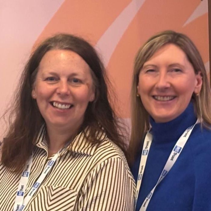 Julie and her colleague at the MS 2026 conference