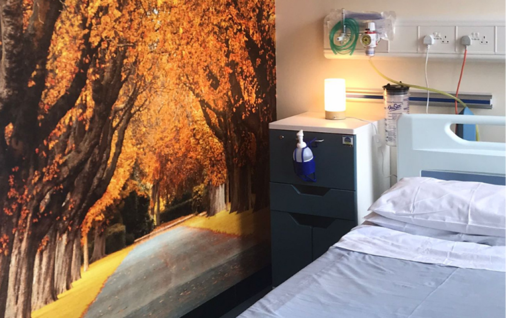 Bedroom with Autumn leaf artwork